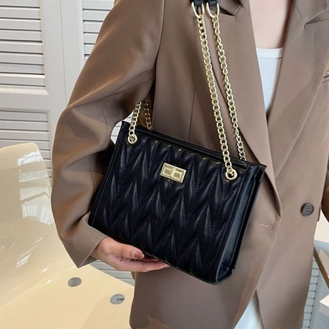 Sac à bandoulière matelassé en similicuir avec bandoulière en chaîne