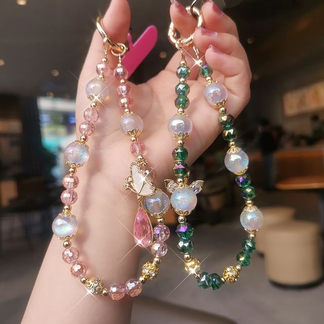 Dragonne de téléphone en faux cristal avec coussinet pour cordon