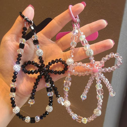 Dragonne de téléphone avec nœud en faux cristal et coussinet pour cordon