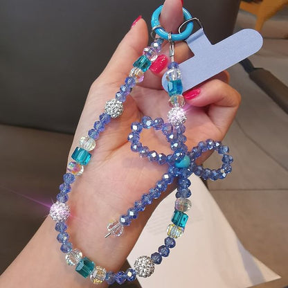 Dragonne de téléphone avec nœud en faux cristal et coussinet pour cordon