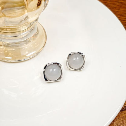 Clous d'oreilles en perles