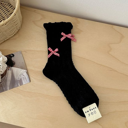 Chaussettes à motifs / avec nœud