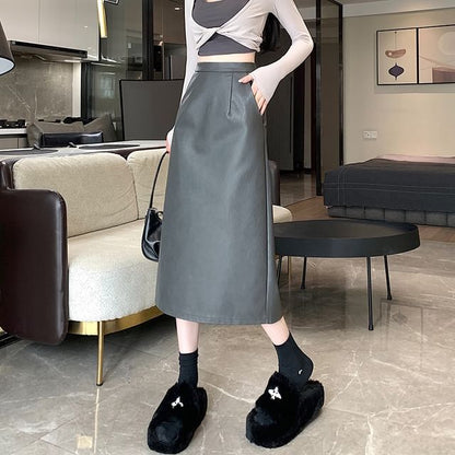 Jupe trapèze mi-longue en similicuir uni à taille haute