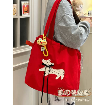 Sac fourre-tout en toile avec cordon de serrage et appliques de dessin animé