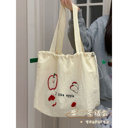 Sac fourre-tout en toile avec cordon de serrage et appliques de dessin animé