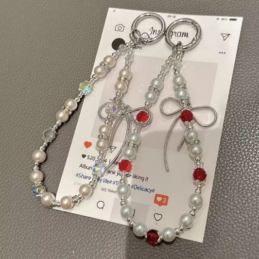 Pad Bow Phone Faux with Pearl Lanyard Strap