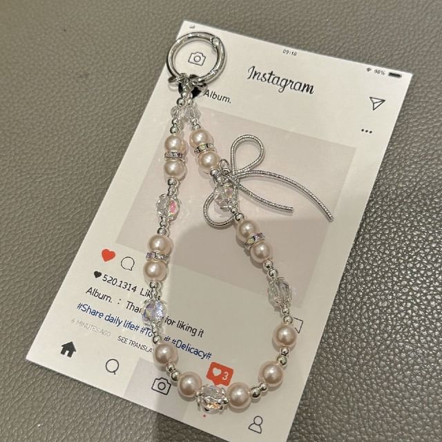 Pad Bow Phone Faux with Pearl Lanyard Strap