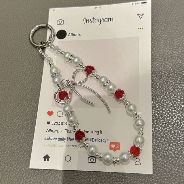 Pad Bow Phone Faux with Pearl Lanyard Strap