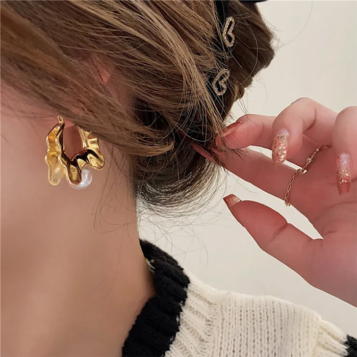 Boucles d'oreilles ondulées en perles vintage