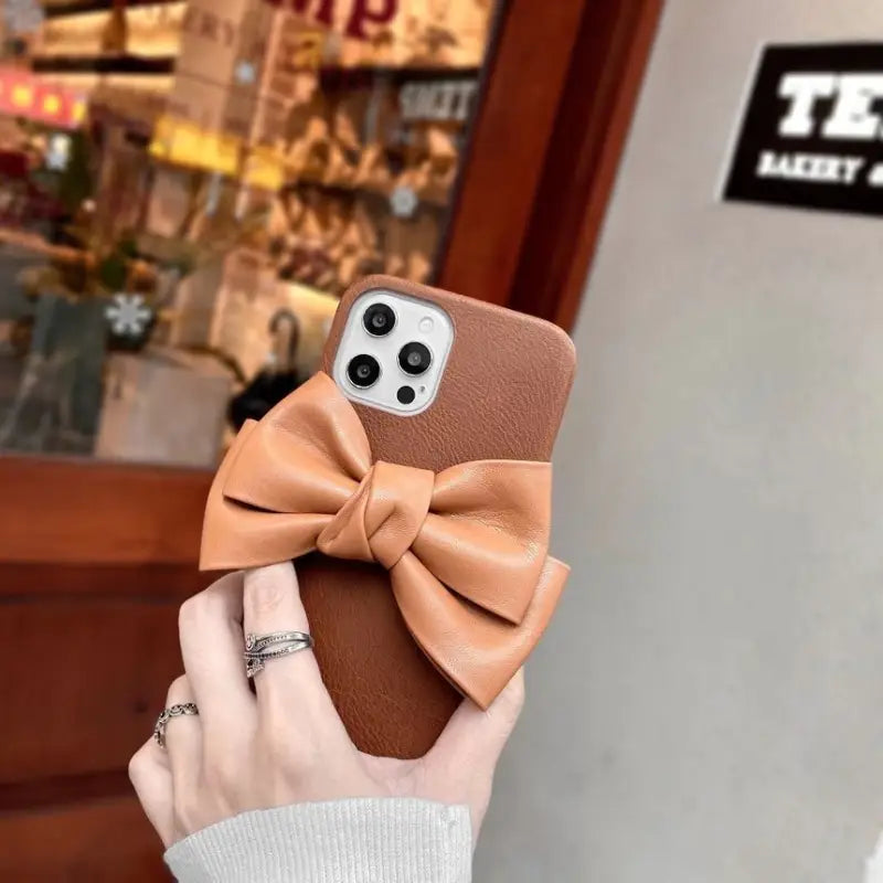 Faux Leather Bow Phone Case - iPhone 13 Pro Max / 13 Pro / 13 / 12 Pro Max / 12 Pro / 12 / 11 Pro Max / 11 Pro / 11 / XS Max / XR / XS / X / 8 Plus / 7 Plus / 8 / 7 / SE 2-3