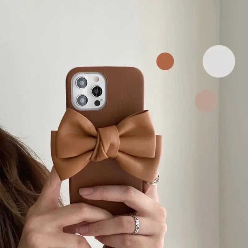 Faux Leather Bow Phone Case - iPhone 13 Pro Max / 13 Pro / 13 / 12 Pro Max / 12 Pro / 12 / 11 Pro Max / 11 Pro / 11 / XS Max / XR / XS / X / 8 Plus / 7 Plus / 8 / 7 / SE 2-6